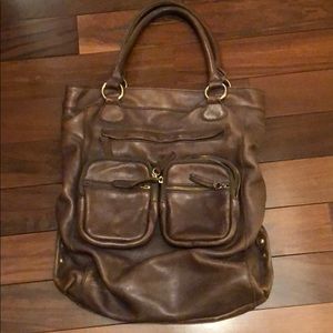 J. Crew grey leather bag with gold hardware